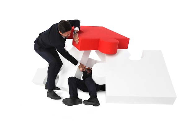 Businessman saving colleague