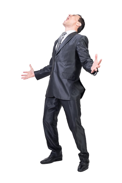 Businessman screaming loudly in studio White background