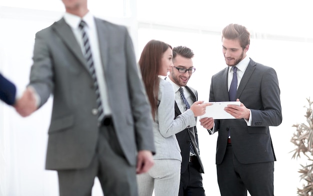 Businessman shaking hands to seal a deal with his partner