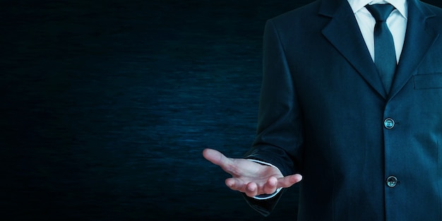 Businessman showing empty hand