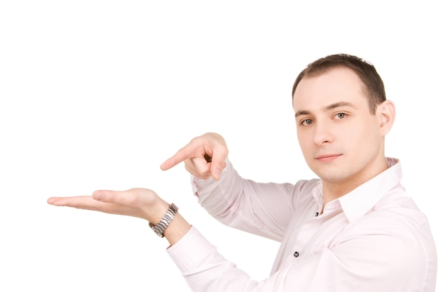 businessman showing something on the palm of his hand