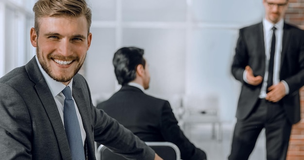 Businessman sitting at business training