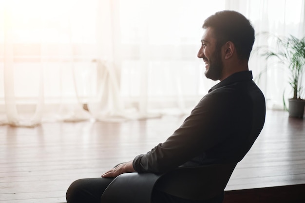 Businessman sitting in his new office startup concept