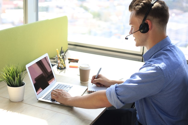 Businessman speak talk on video call with colleagues on online briefing during self isolation and quarantine. Flu epidemic and covid-19.