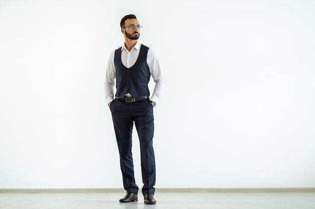 The businessman standing on the white background