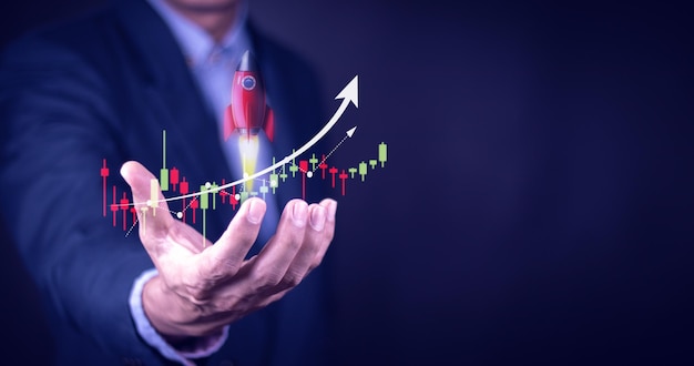 Businessman or stock trader analyzing stock graph chart side view stock trader