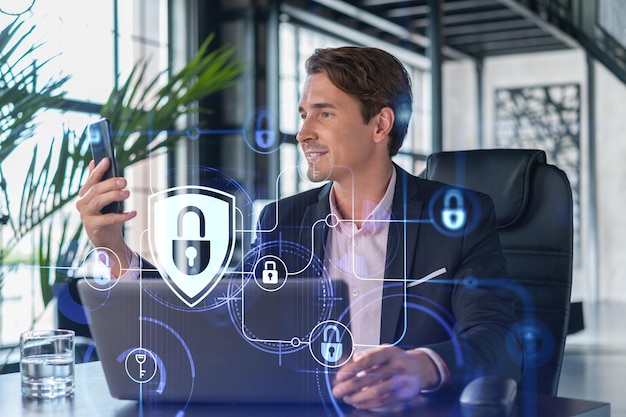 Businessman in suit checking cyber security using smart phone to protect clients confidential information IT hologram lock icons over modern panoramic office background