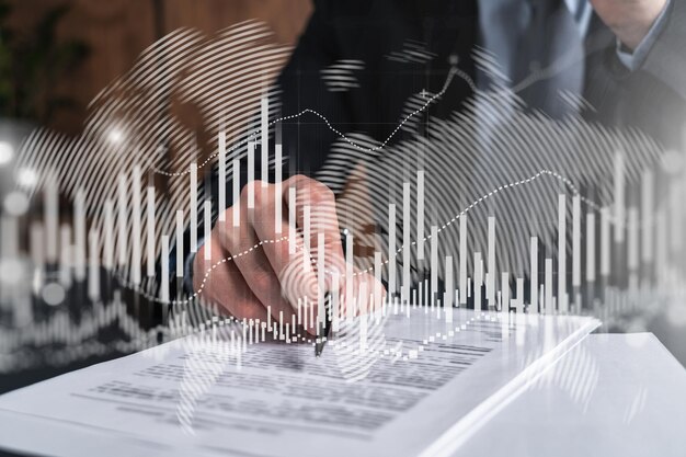 Businessman in suit signs contract Double exposure with forex graph hologram Man signing brokerage agreement Financial market analysis and investment concept