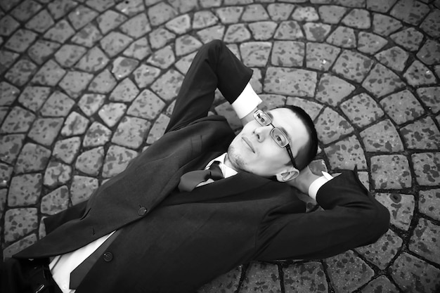 Businessman in a suit on the street black-and-white photo