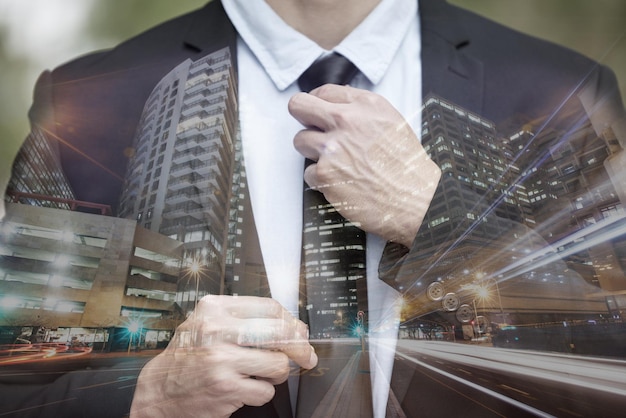 Businessman suit and tie with double exposure of city with hands night or street with motion blur Executive man metro or buildings with dark holographic overlay for leader manager or cityscape