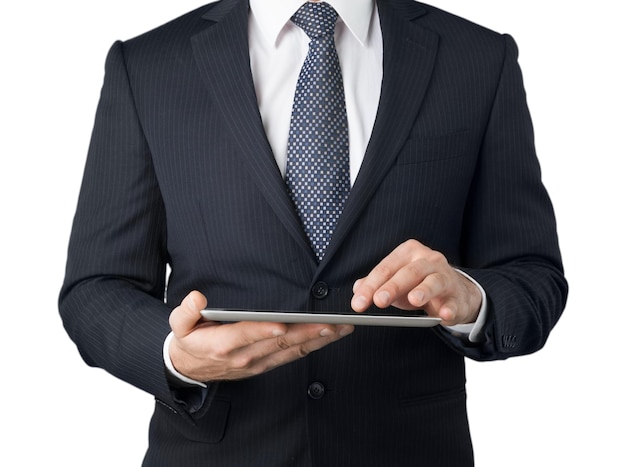 Businessman and tablet pc   on  background