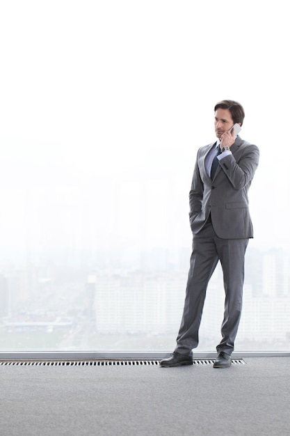 Businessman talking by phone