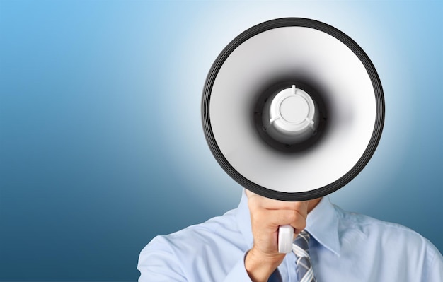 Businessman talking on the megaphone