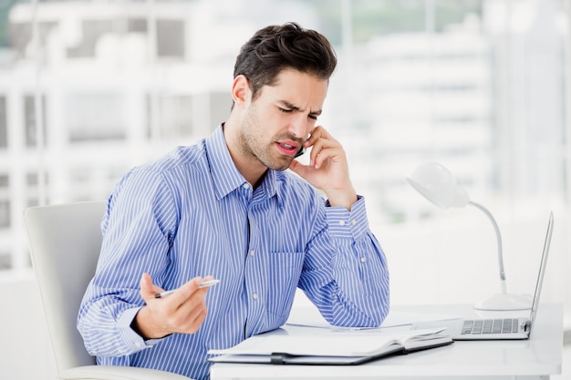 Businessman talking on mobile phone