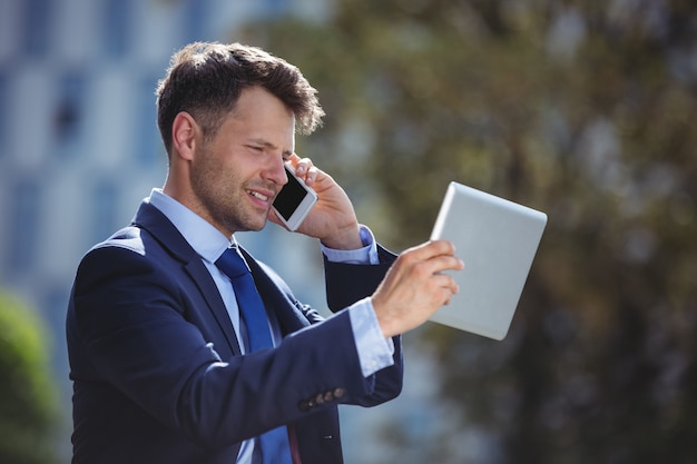 Businessman talking on mobile phone