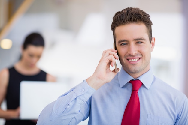 Businessman talking on mobile phone