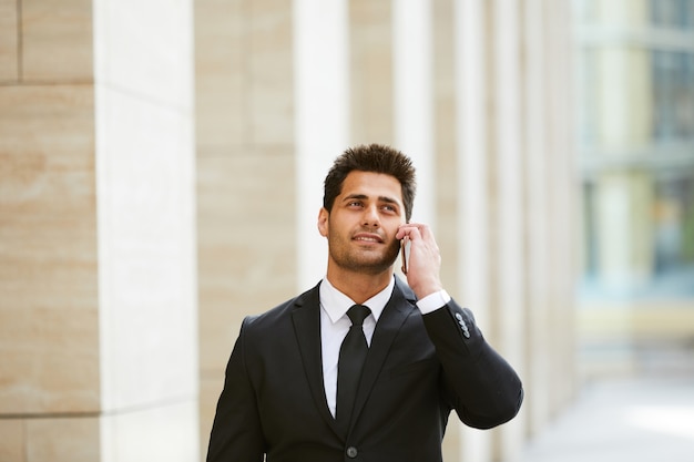 Businessman talking on mobile phone