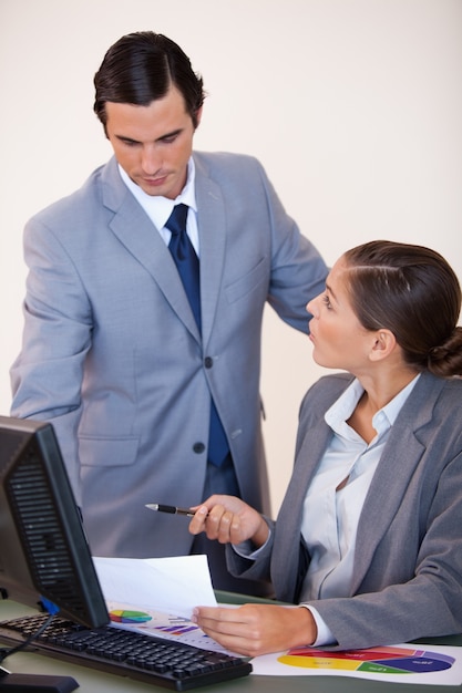 Businessman talking with his secretary