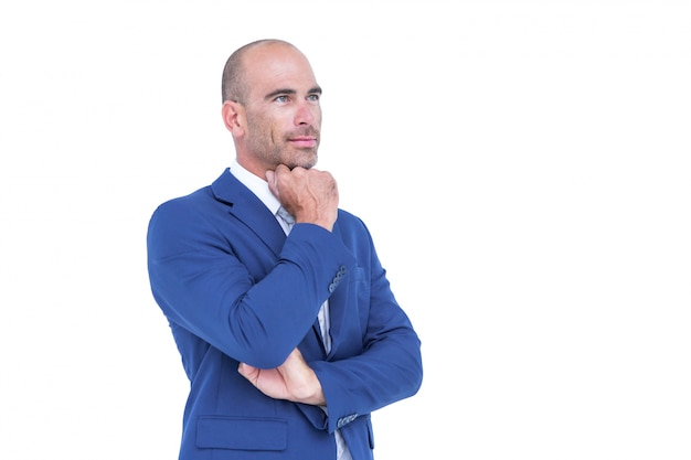 Businessman thinking with hand on chin