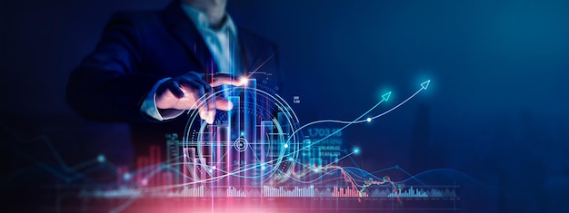 Businessman touch growth graph and progress of business and analyzing financial and investment data