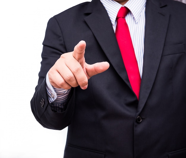 Businessman touching a blank invisible screen. Touch screen concept image. Isolated