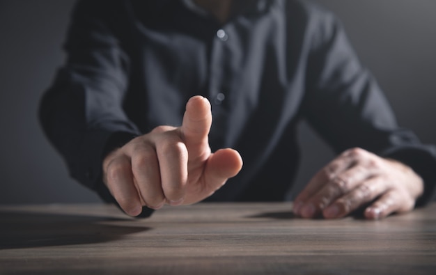 Businessman touching in empty screen.