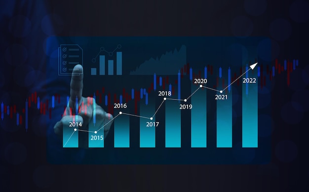 Businessman trader or investor holding digital graph on technology visual screen for trading online stock market forex or stock exchange