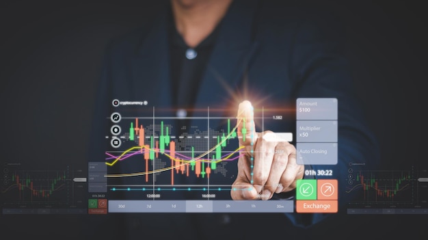 Businessman or trader is pointing a growing virtual hologram stock planning analyze indicator and strategy buy and sell Stock market Business growth progress or success conceptnvest in trading