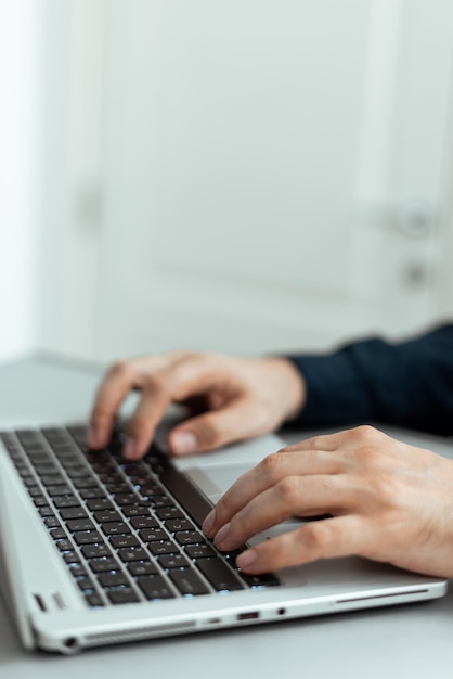 Businessman Typing Recent Updates On Lap Top Keyboard On Desk Man In Office Writing Important Message On Computer Executive Inserting Crutial Data Into Pc