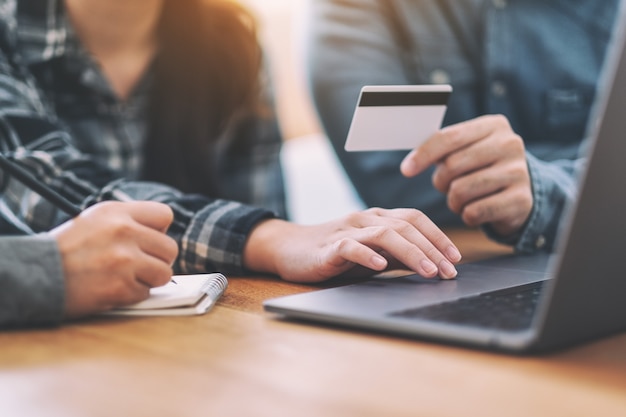 Businessman using credit card for purchasing and shopping online