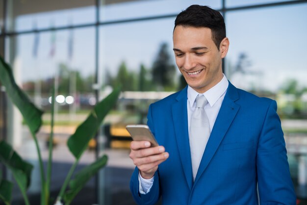 Businessman using his mobile phone