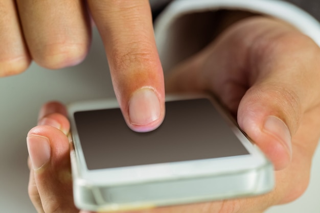 Businessman using his smart phone