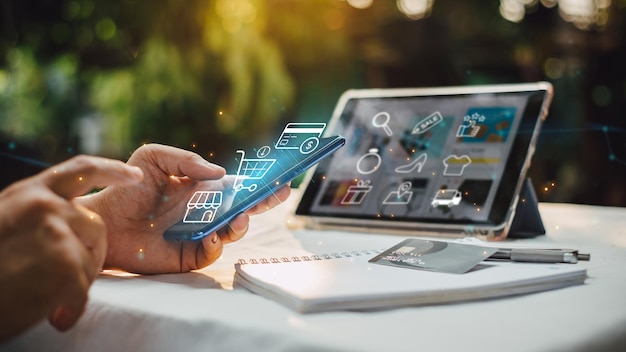 Businessman using smartphone and credit card for online shopping and internet banking