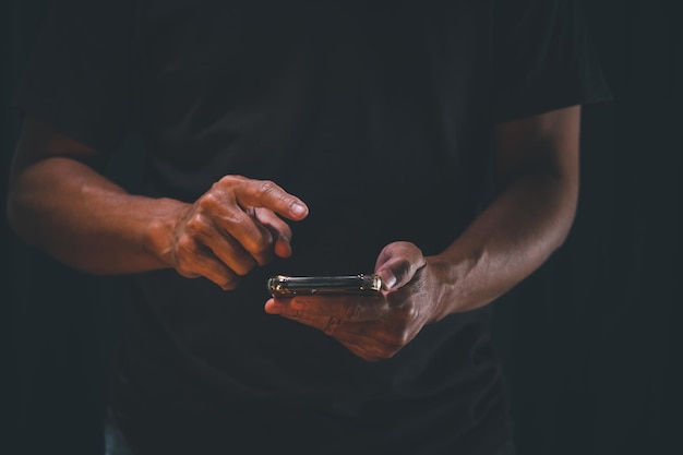 Businessman using smartphone at night time