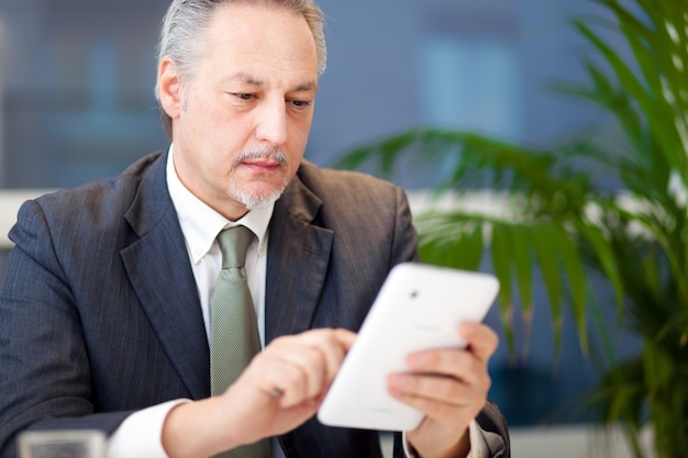 Businessman using a tablet