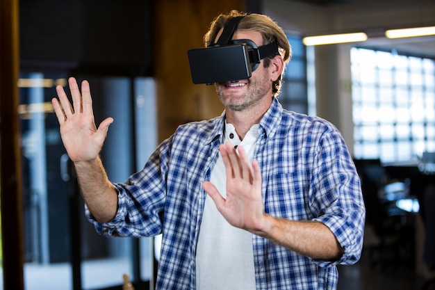 Businessman using virtual reality simulator