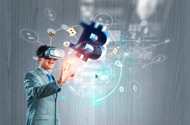 Businessman in VR headset and touch screen and bitcoin symbol. Mixed media