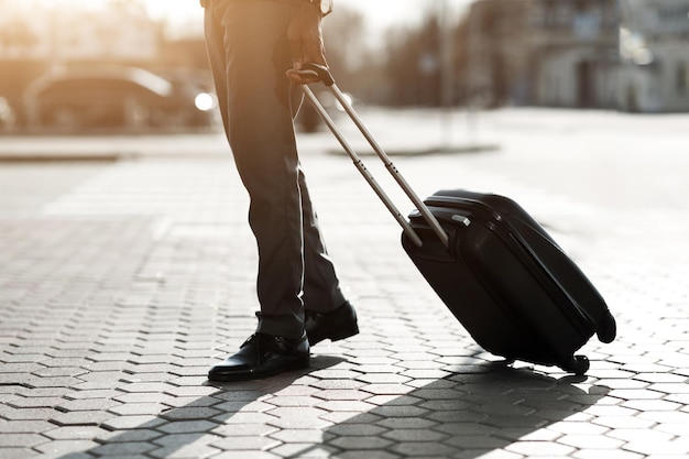 Businessman Walk with Luggage Arriving At Airport