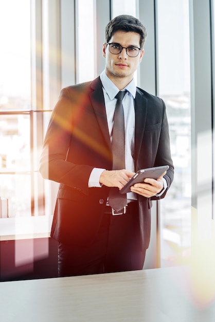 Businessman wearing glasses at office