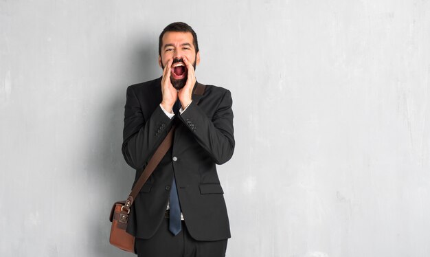 Businessman with beard shouting and announcing something