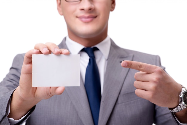 Businessman with blank card isolated on white 