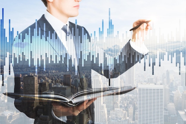 Businessman with book and stock market