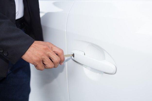 Businessman with car key