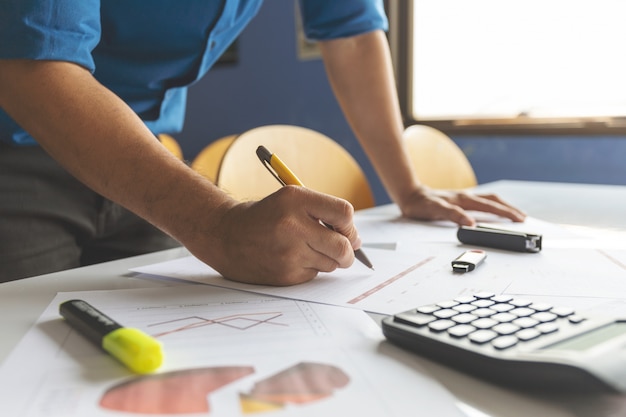 Businessman work from home with soft-focus and over light in the wall