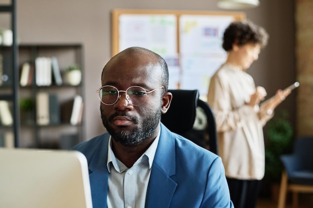 Businessman working on computer at office