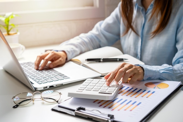 Businessman working on Desk office business financial accounting calculate Graph analysis