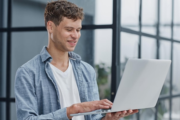 Businessman working on a laptop computer in the office