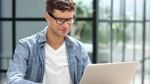 Businessman working on a laptop computer in the office