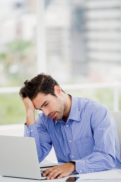 Businessman working on laptop