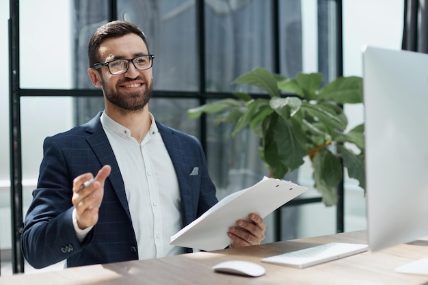 Businessman working in the office He is using touchpad while re